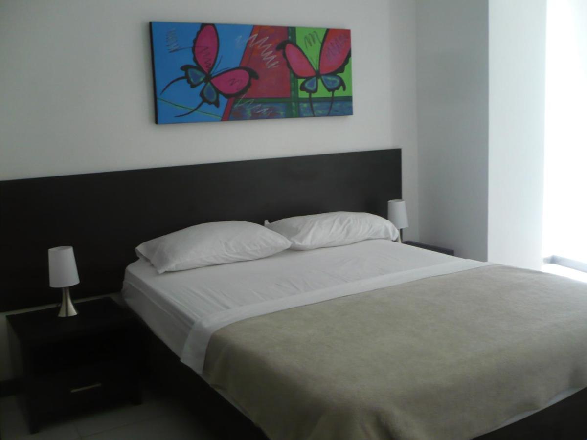 Apartasuites San Marcos Cali Rum bild